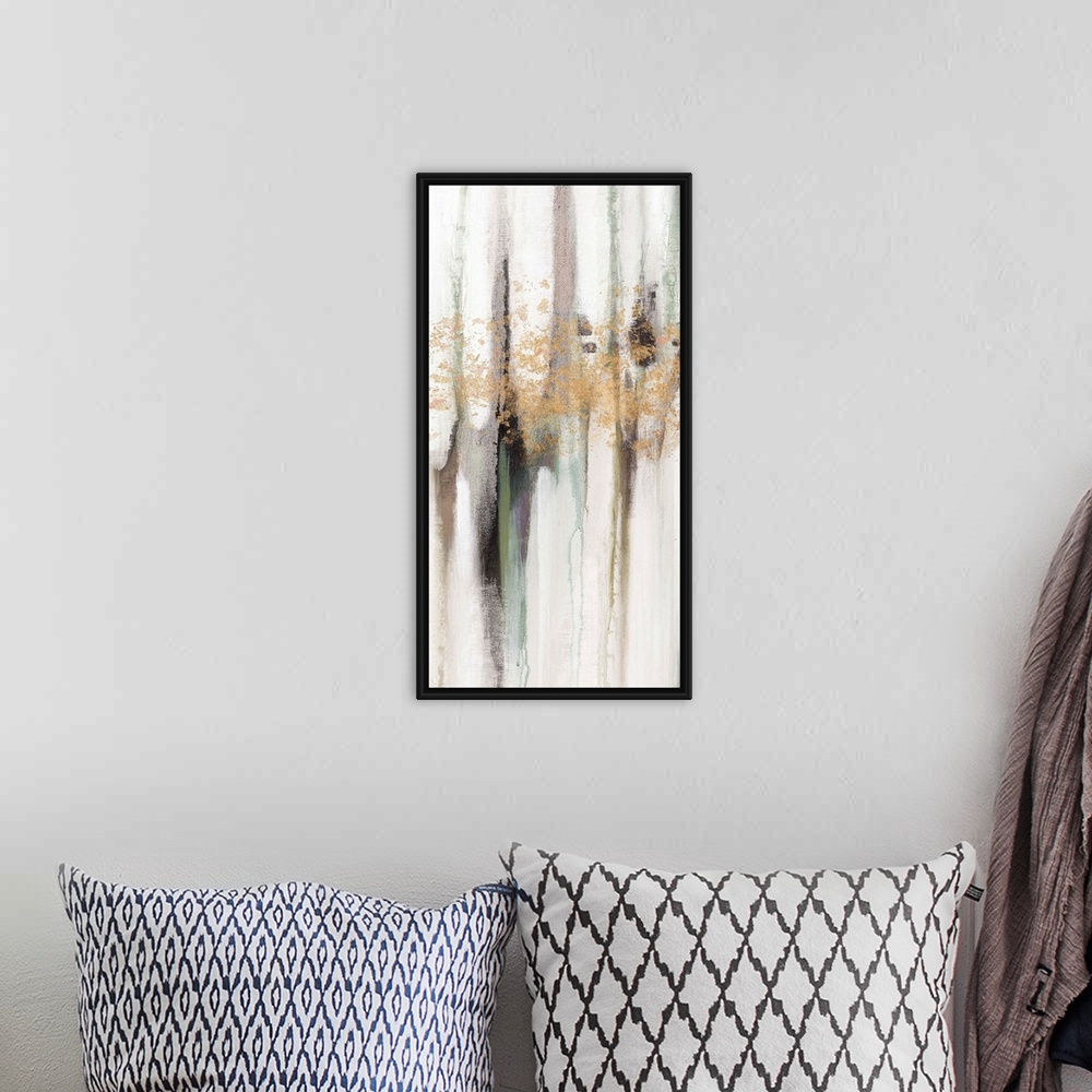A bohemian room featuring Contemporary abstract painting using tones of pale gray and gold splashes of color.