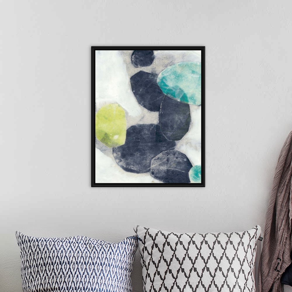 A bohemian room featuring Contemporary painting with abstracted ovular forms in indigo and green on a neutral background.