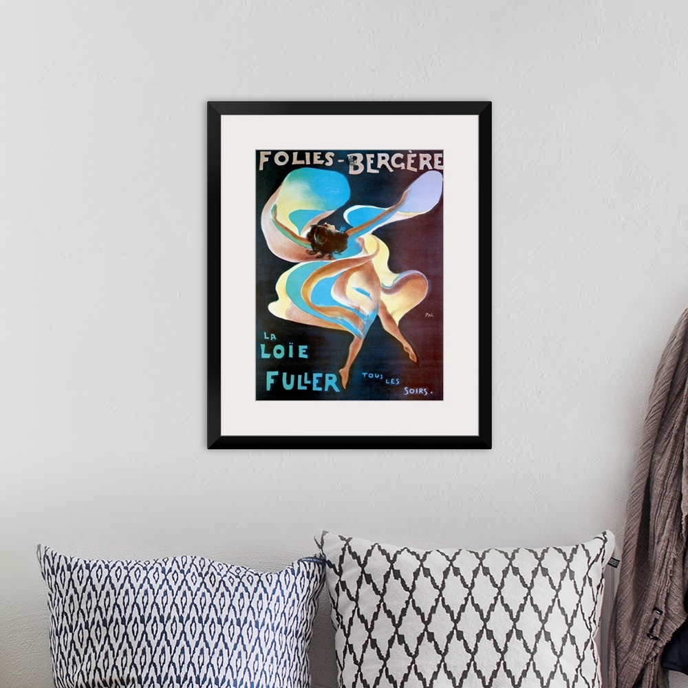 A bohemian room featuring Vintage theater poster of a woman draped in flowing fabric dancing for a live entertainment act f...