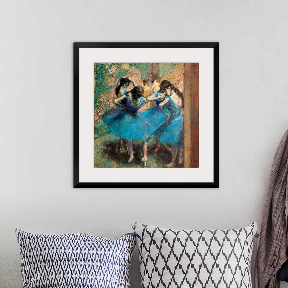 A bohemian room featuring Edgar Degas' famous painting of four ballerinas practicing in the foreground with other figures v...
