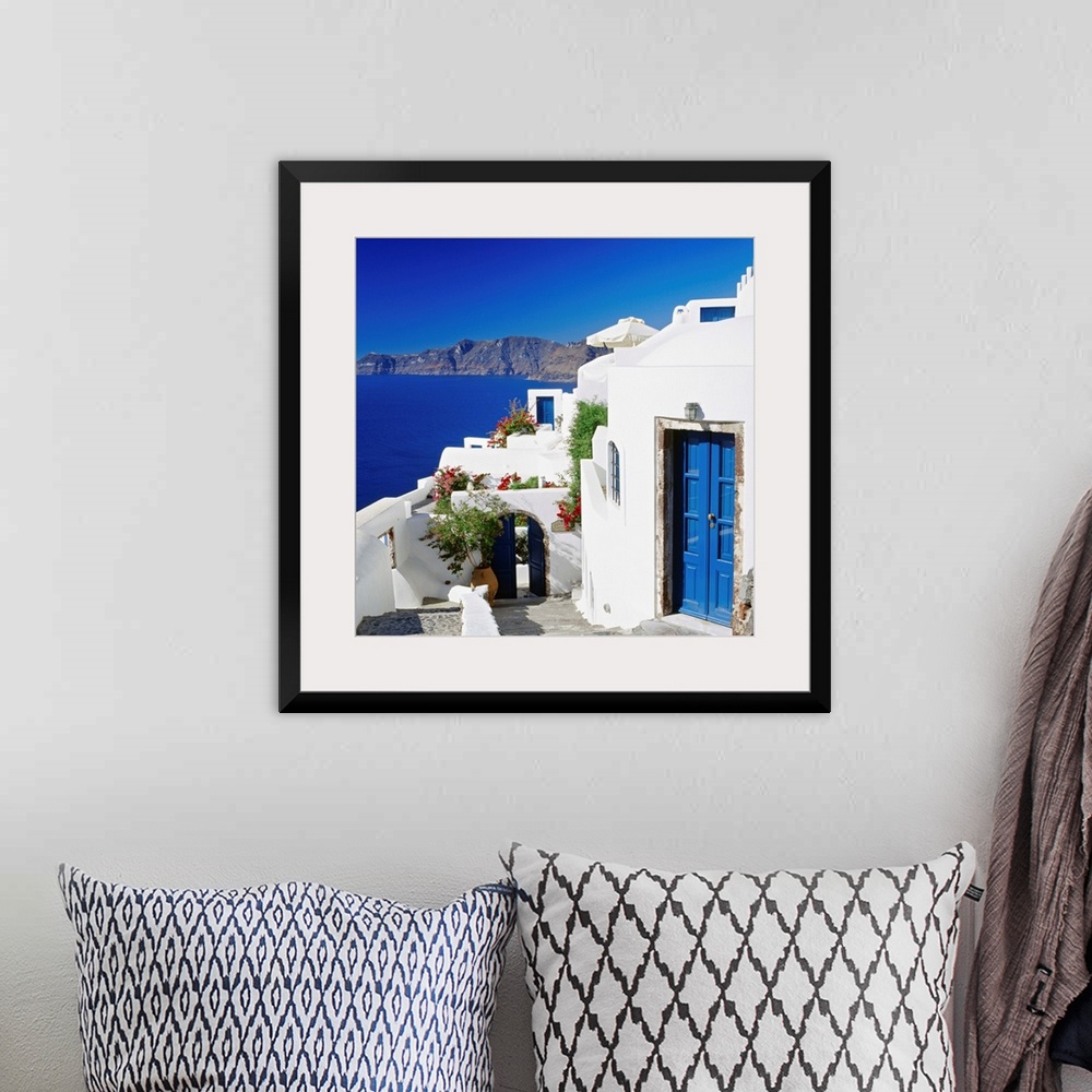 A bohemian room featuring Greece, Aegean islands, Cyclades, Santorini, traditional houses and the crater