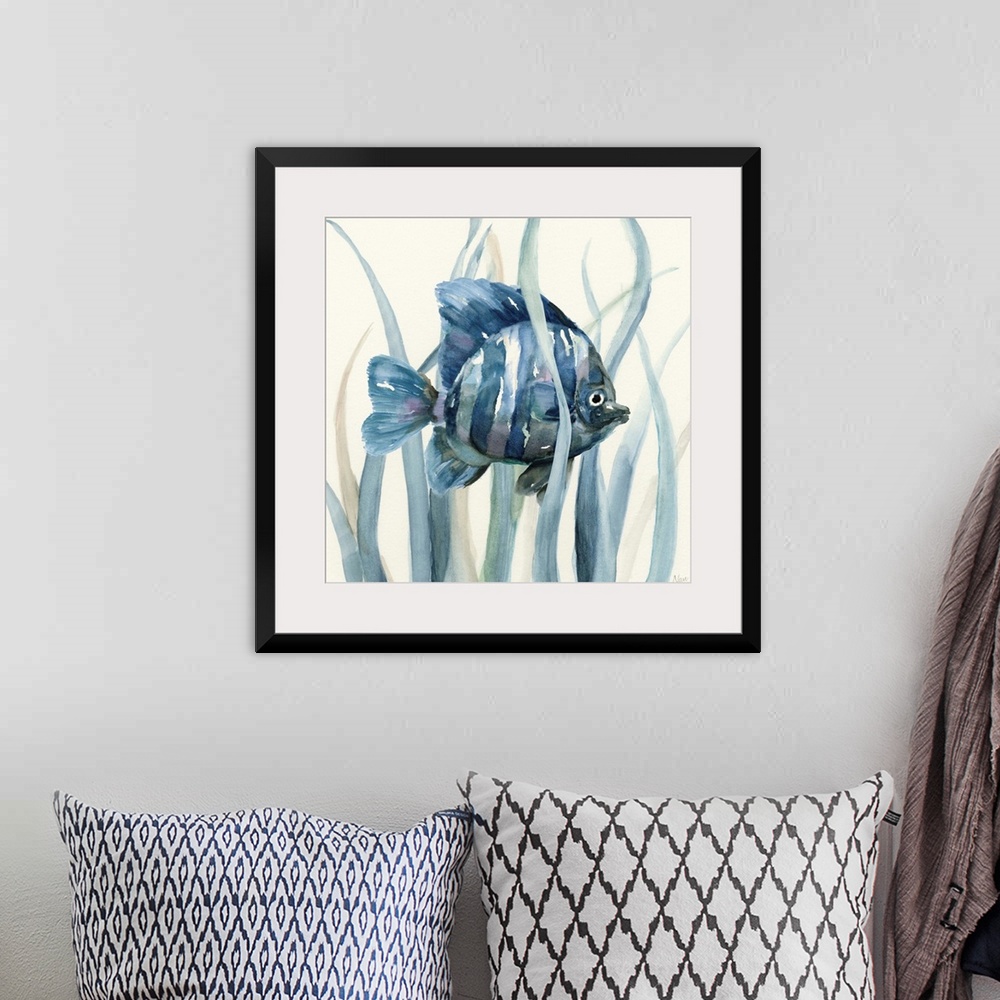 A bohemian room featuring Square indigo watercolor painting of a fish underwater in seagrass on an off white background.