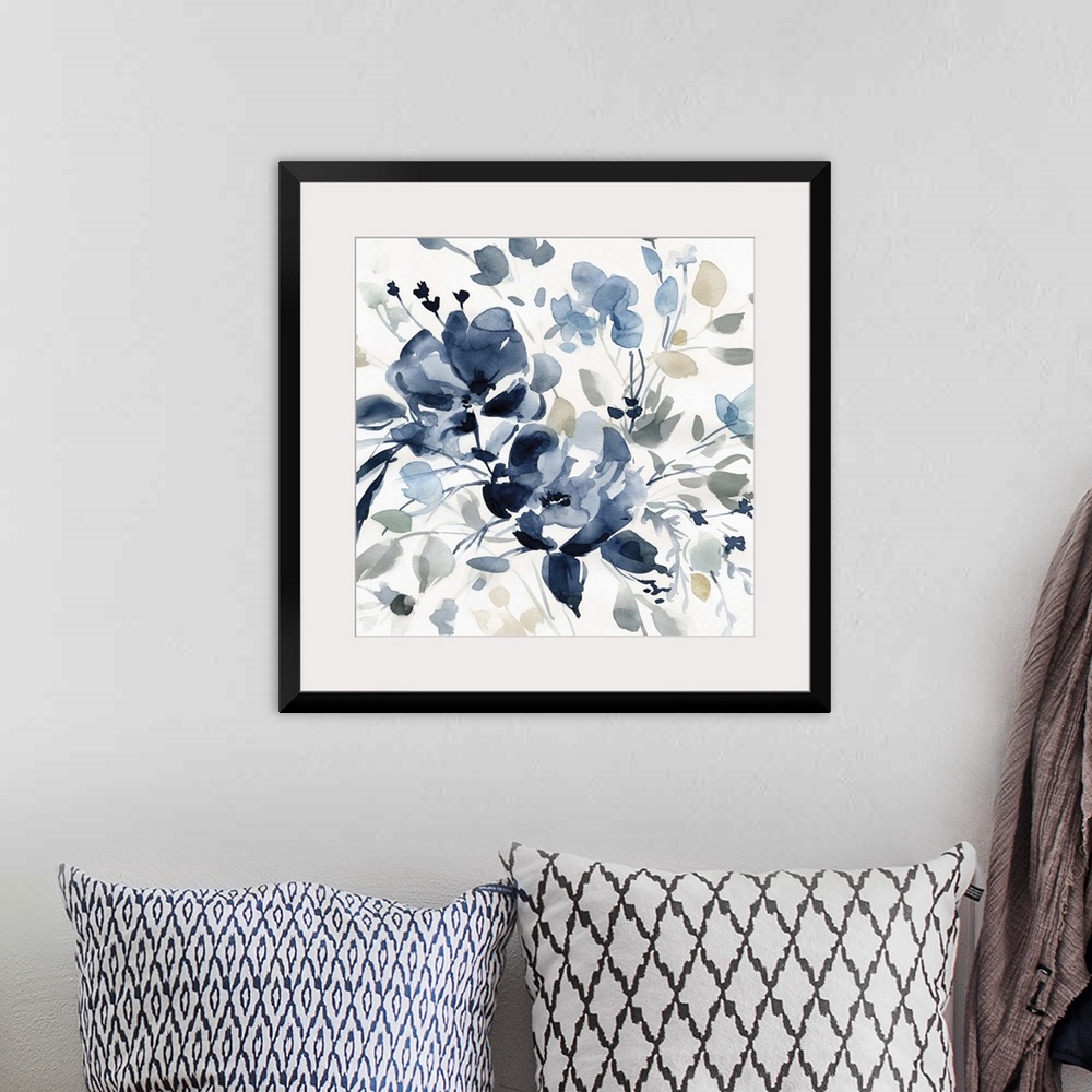 A bohemian room featuring Square watercolor painting of flowers with indigo, gray, and tan hues.