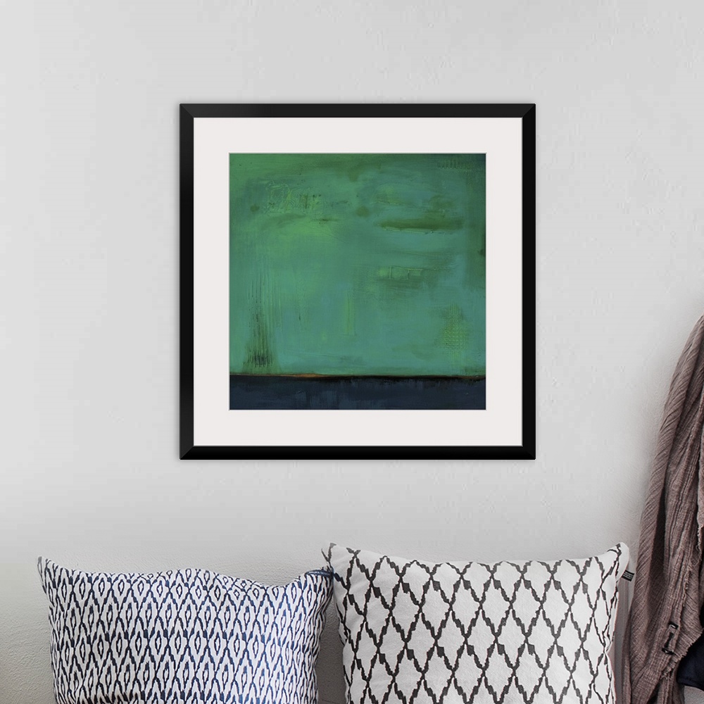 A bohemian room featuring Square, abstract painting featuring large blocks of color in green and dark blue/gray