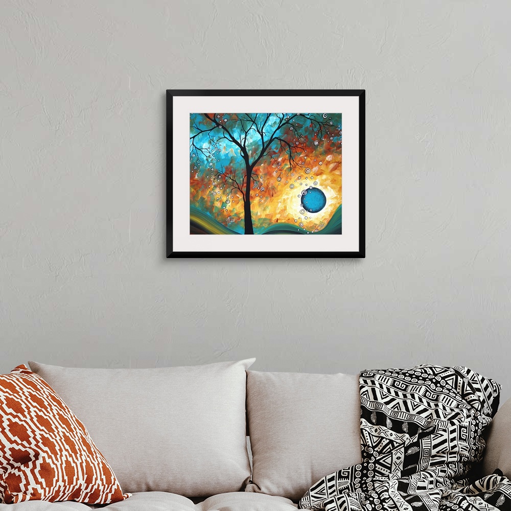 A bohemian room featuring This is an abstract painting of a silhouetted tree in front of a multi-hued psychedelic landscape.