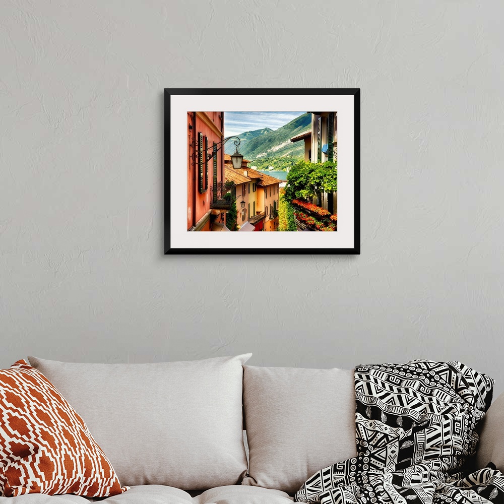 A bohemian room featuring Fine art photo of the roofs of shops in a European city, looking to the lake below.