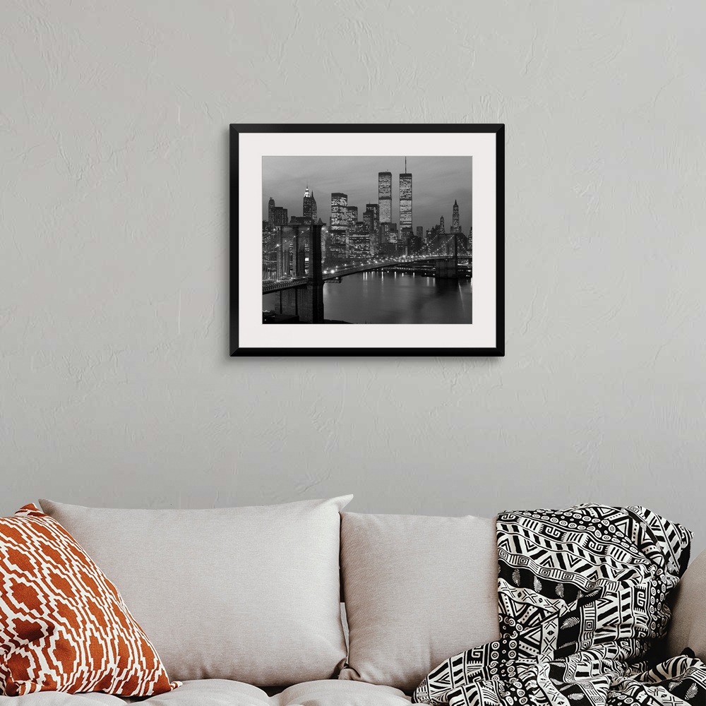 A bohemian room featuring 1980's New York City Lower Manhattan Skyline Brooklyn Bridge World Trade Center.