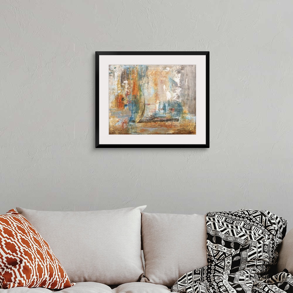 A bohemian room featuring Contemporary abstract painting in orange and blue.