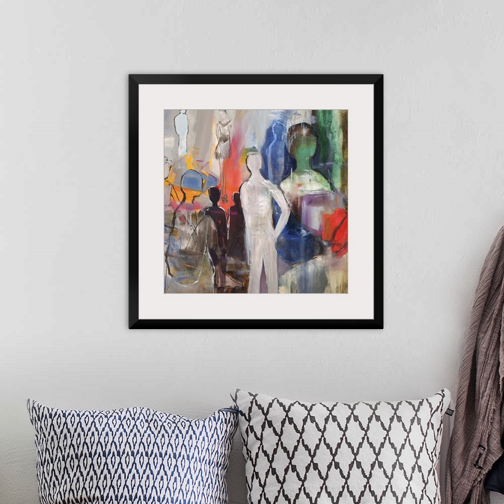 A bohemian room featuring Semi-abstract artwork with several figures in varying size and color.