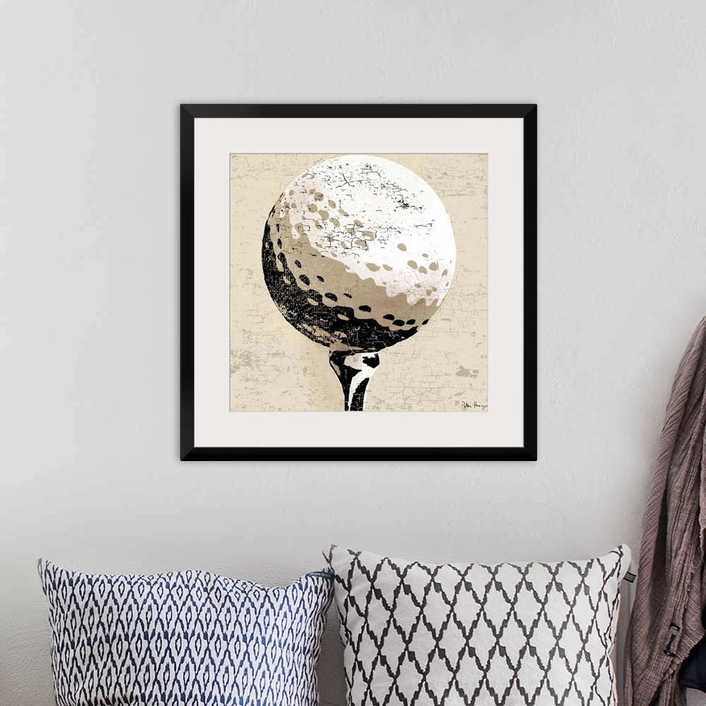 A bohemian room featuring Vintage style wall art of an old distressed golfball on tan and sepia background.