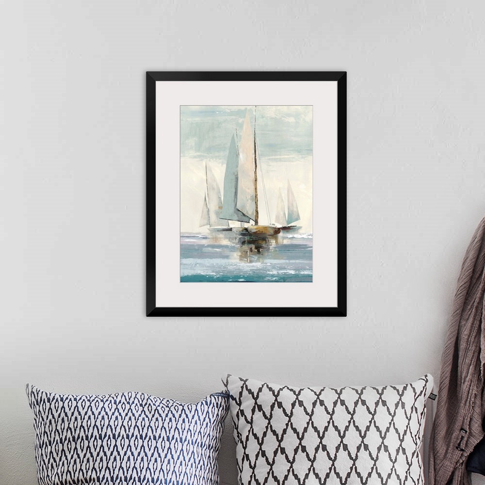 A bohemian room featuring Painting of sailboats on the water in the morning.