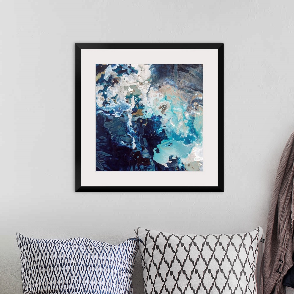 A bohemian room featuring Abstract contemporary painting with dark navy and bright blue splashes.