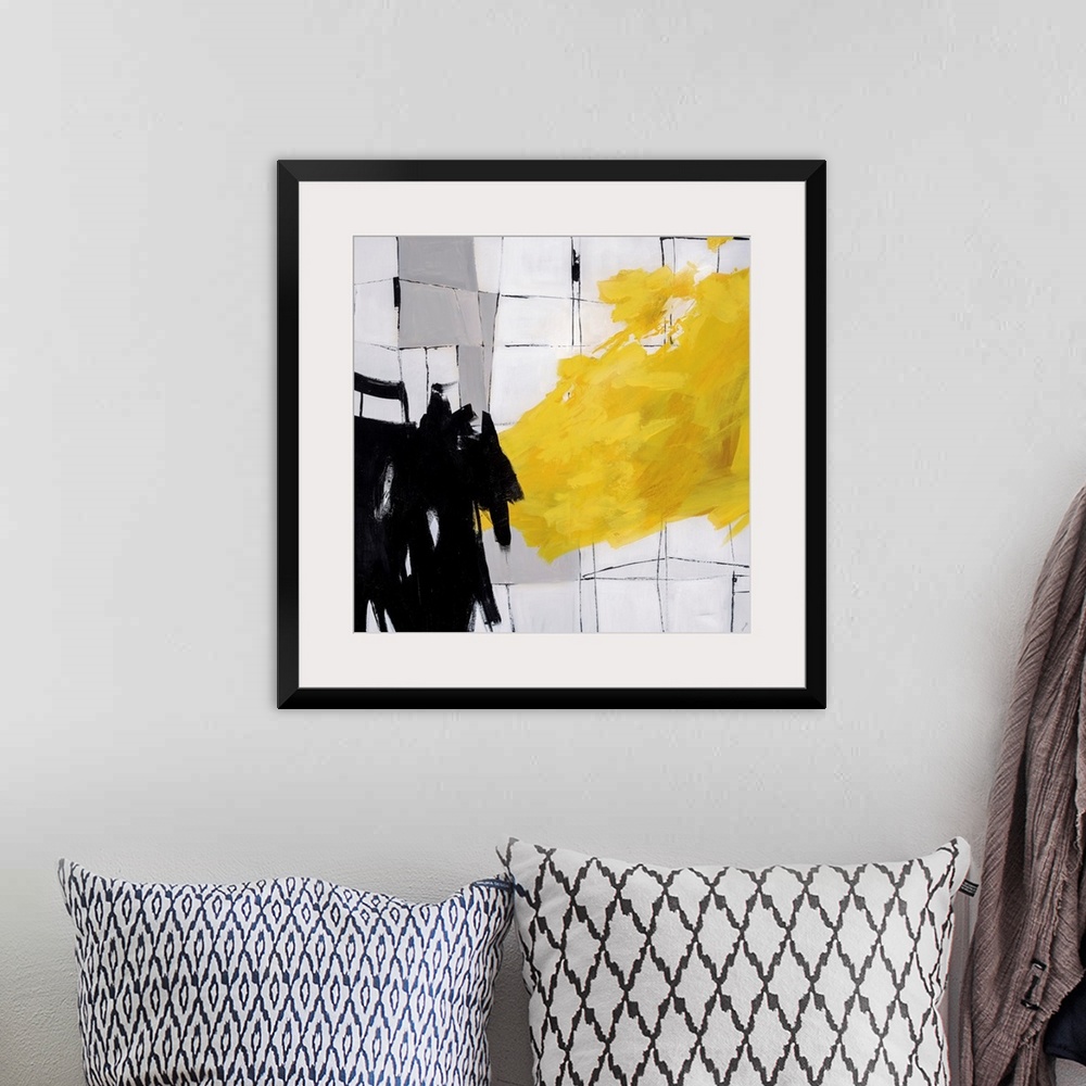 A bohemian room featuring Abstract painting using bright yellow paint strokes and black paint strokes against a cracked til...