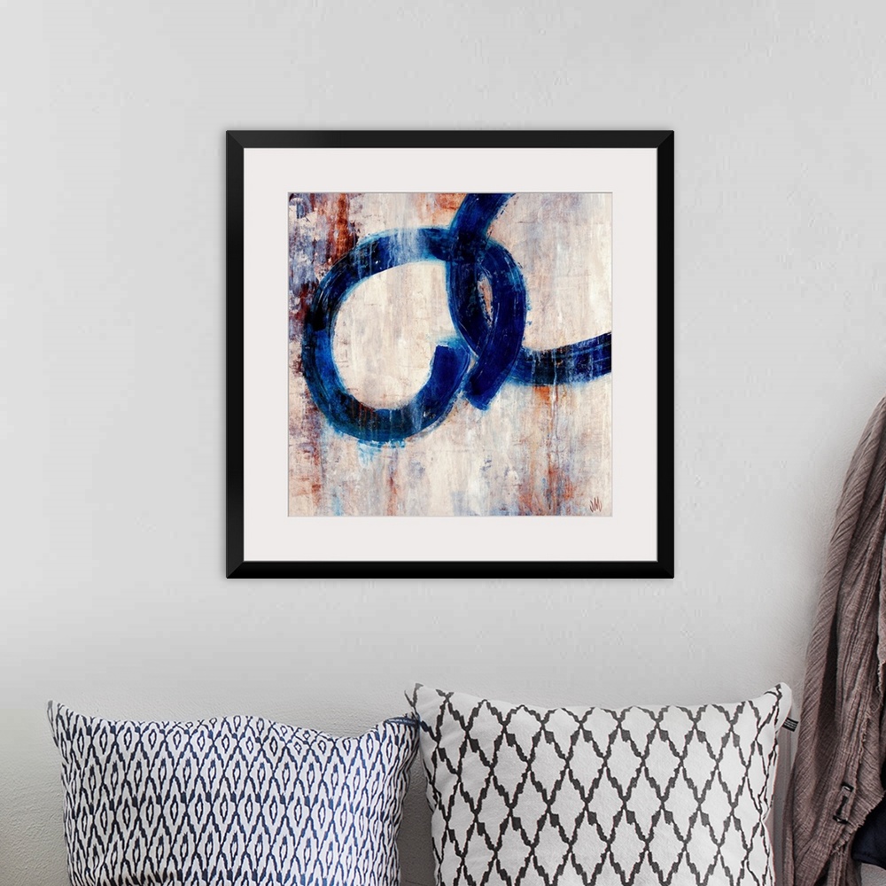 A bohemian room featuring Square, contemporary art on a large canvas of two dark rings interlocking, on a patchy background...