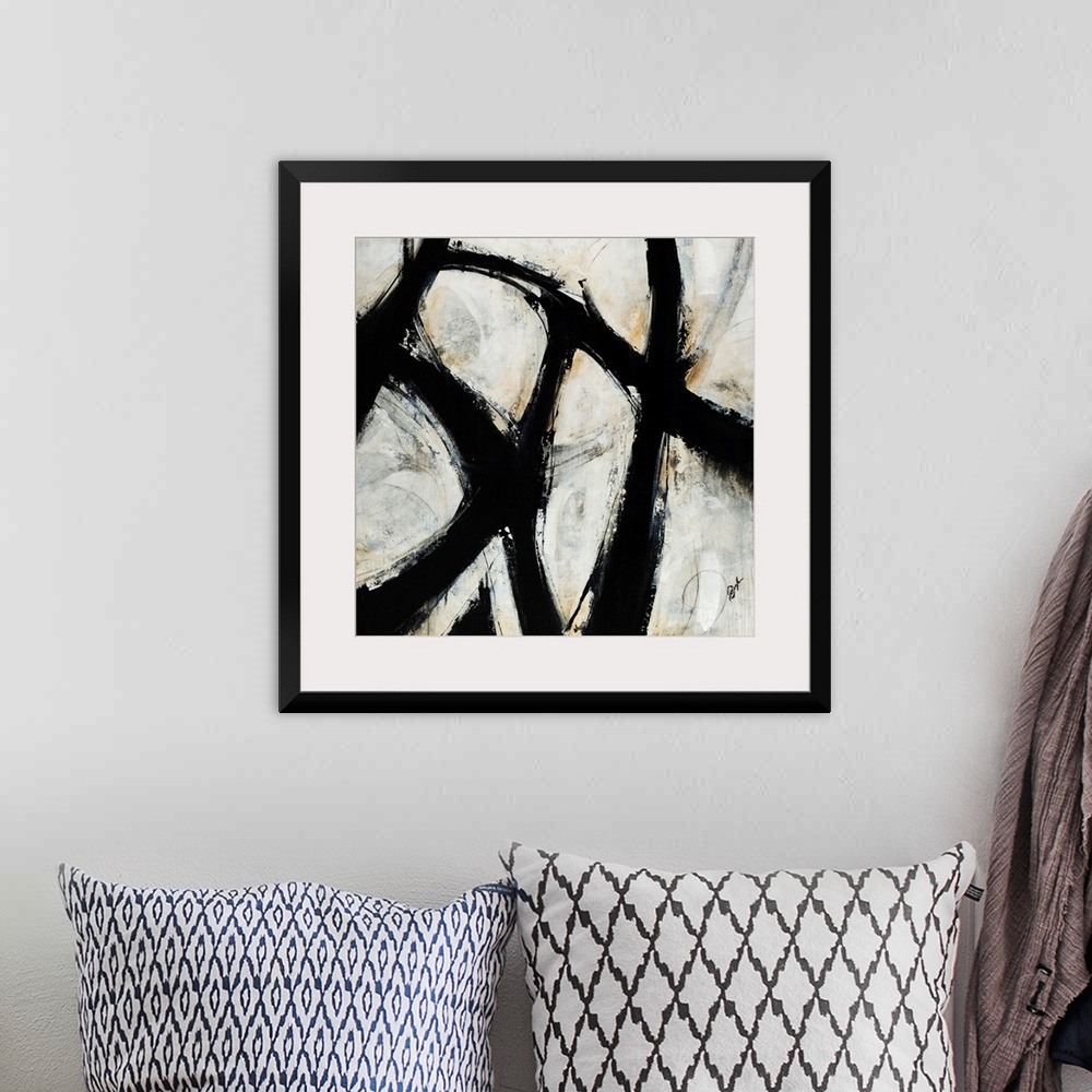 A bohemian room featuring Contemporary abstract painting of black brush strokes over a netural background.