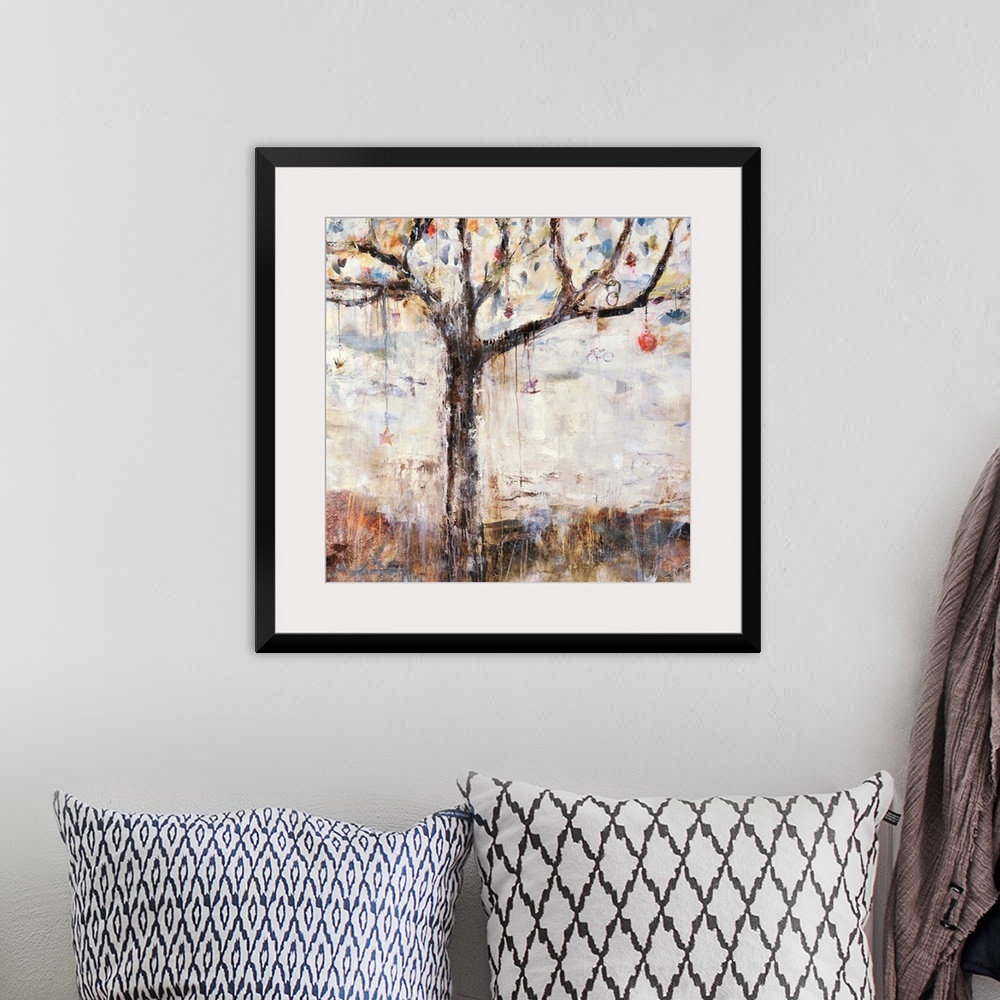 A bohemian room featuring Abstracted painting of a tree with various  charms and bobbles hanging from its branches.