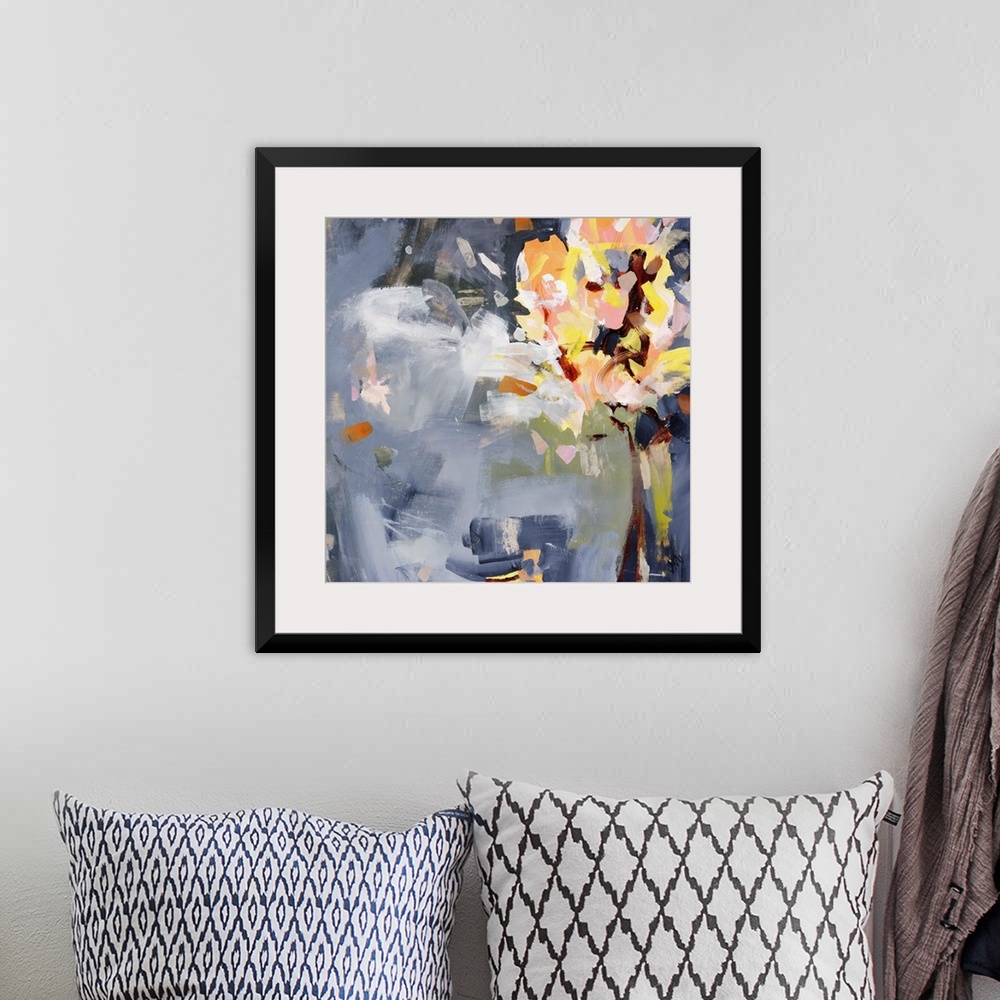 A bohemian room featuring Square abstract painting of florals over an indigo background.