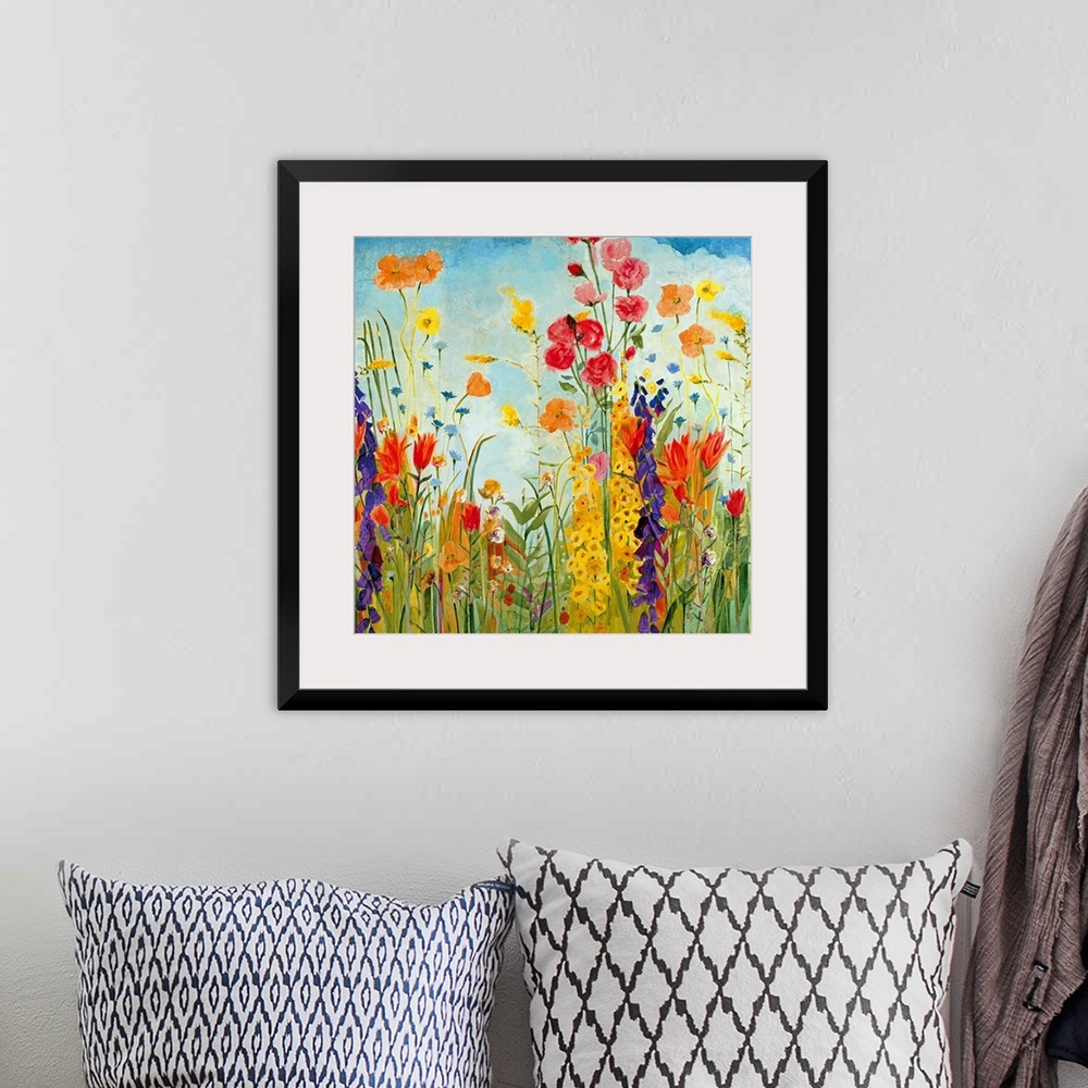A bohemian room featuring A square, contemporary painting of a variety of flowers on a sunny day. Floral wall art perfect f...