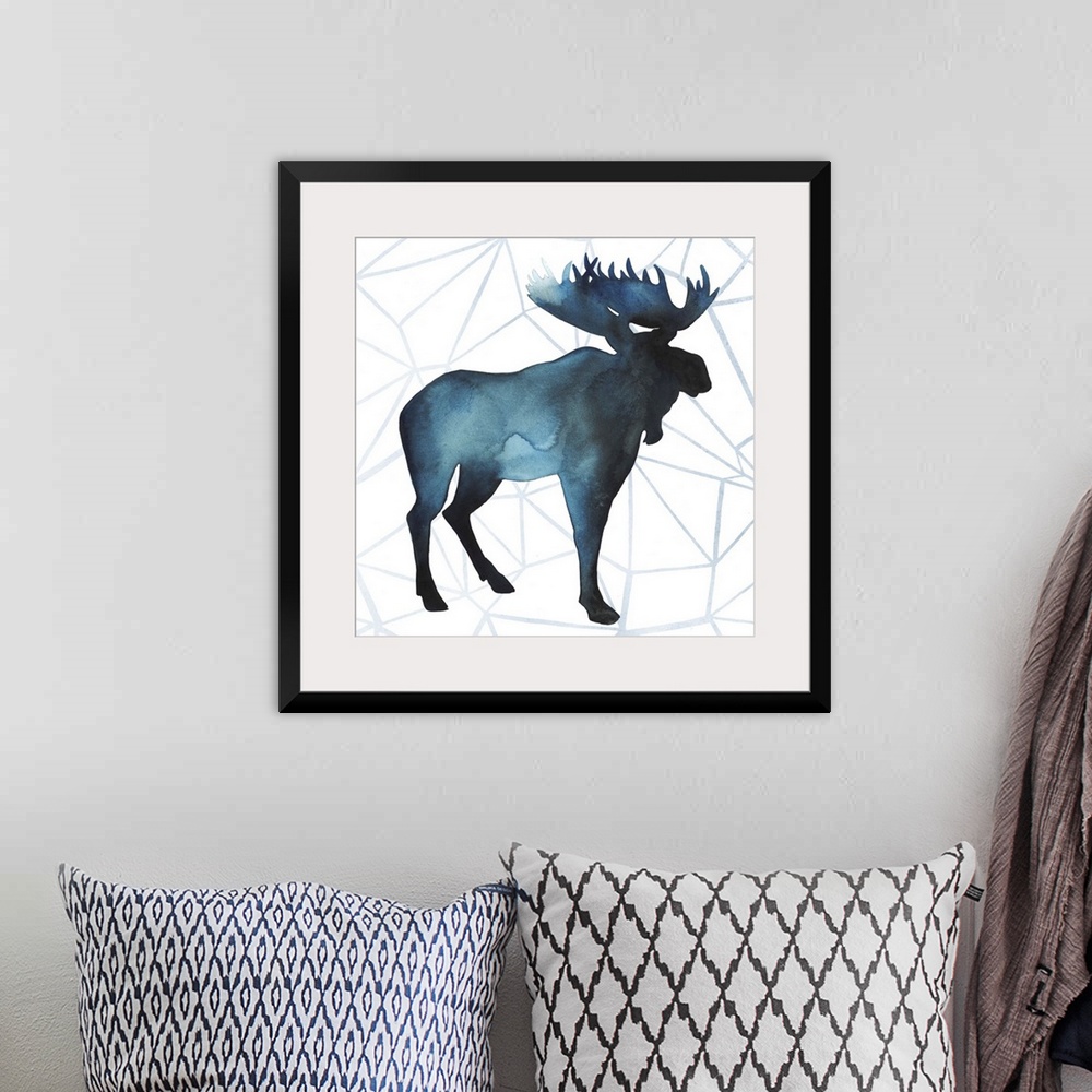 A bohemian room featuring Watercolor moose silhouette on a grey geometric background.