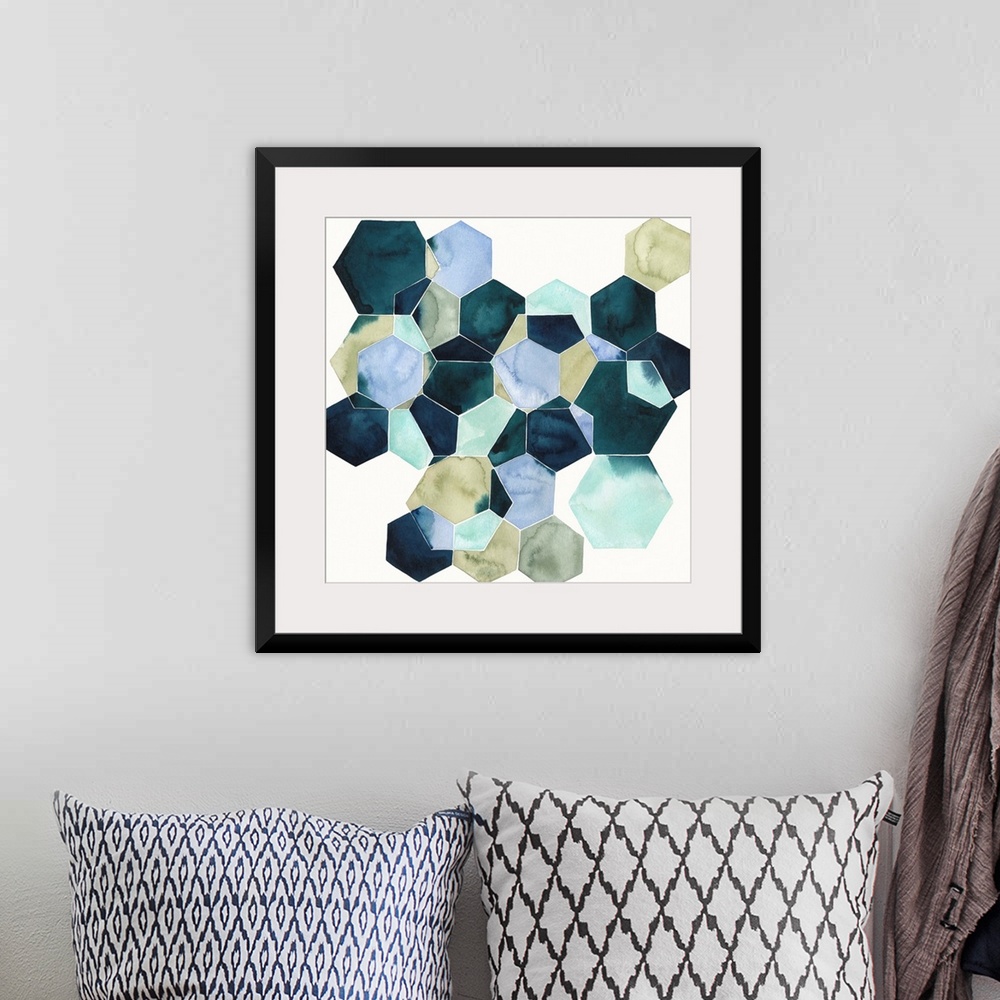 A bohemian room featuring Watercolor geometric painting of intersecting hexagons in blue tones.