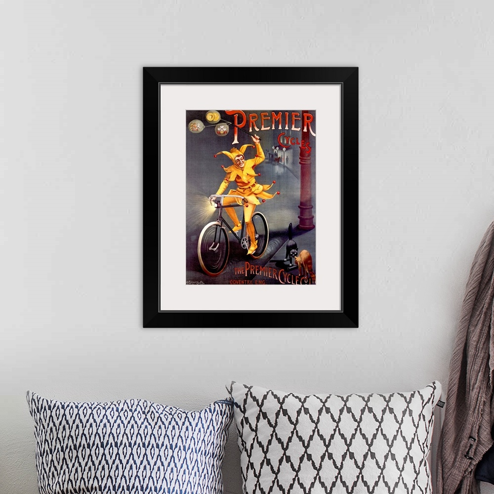 A bohemian room featuring Big canvas painting of a jester riding a bike on a dark street looking at two cats that are about...