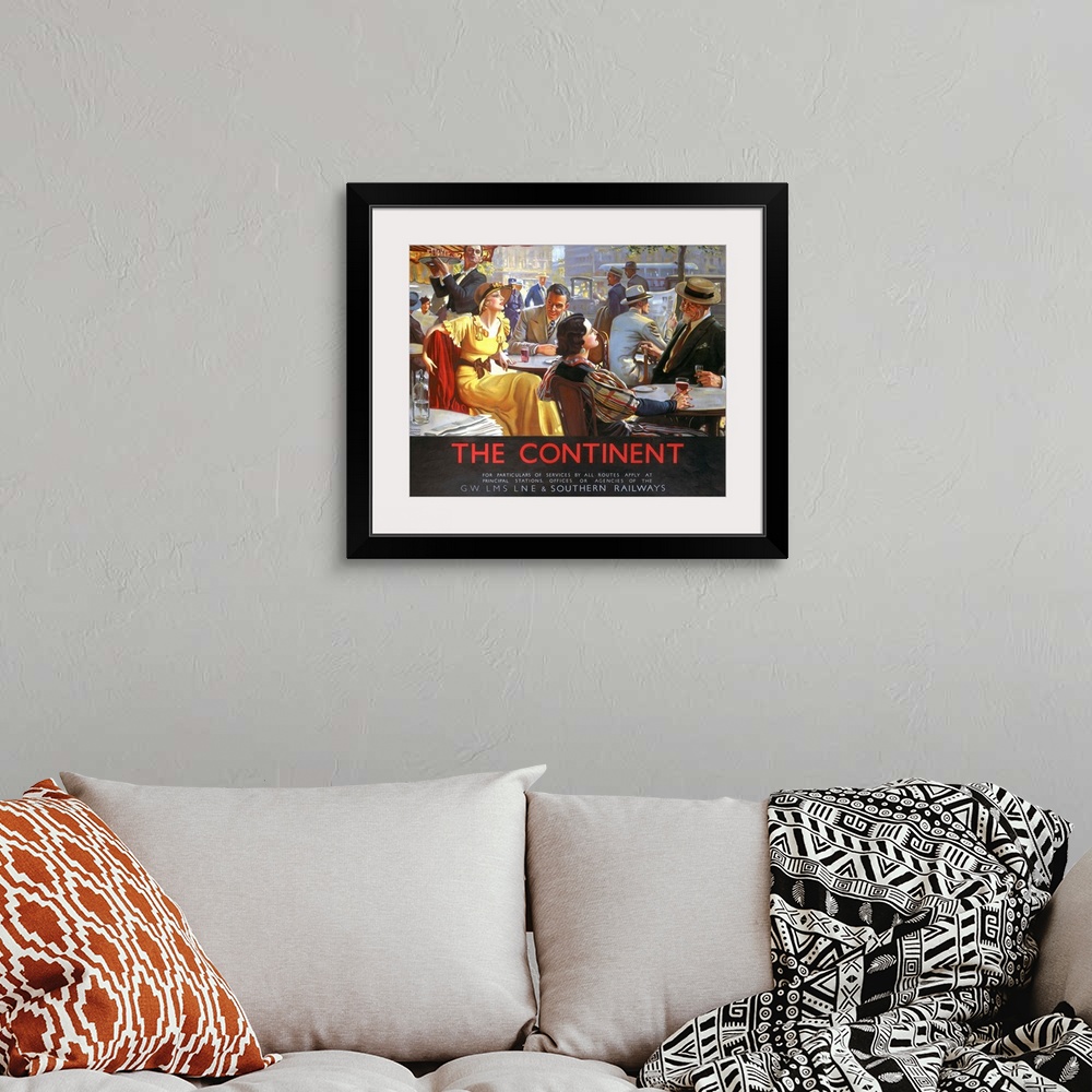 A bohemian room featuring The Continent Cafe Vintage Advertising Poster