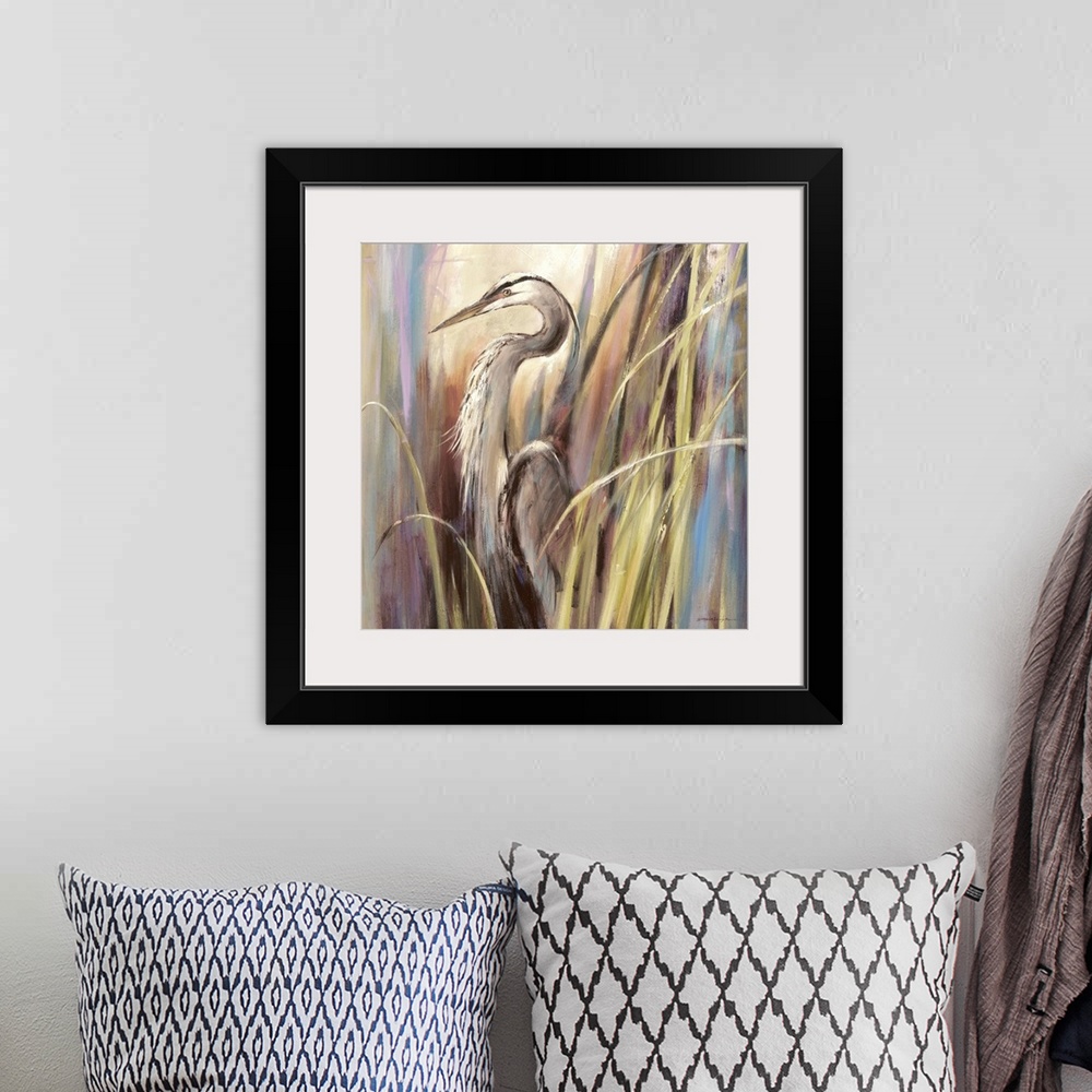 A bohemian room featuring Contemporary painting of a heron standing a-midst tall grass.