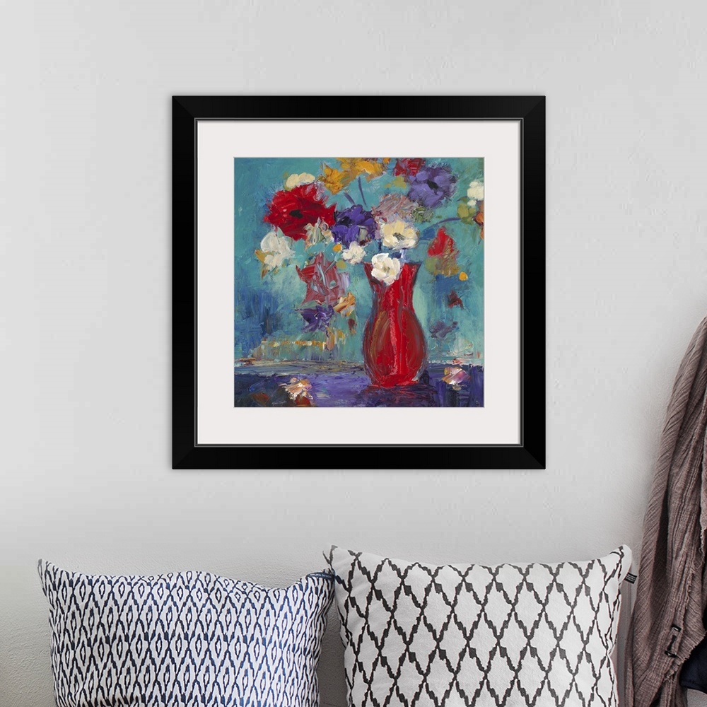 A bohemian room featuring Contemporary still life painting of a red vase filled with colorful flowers.