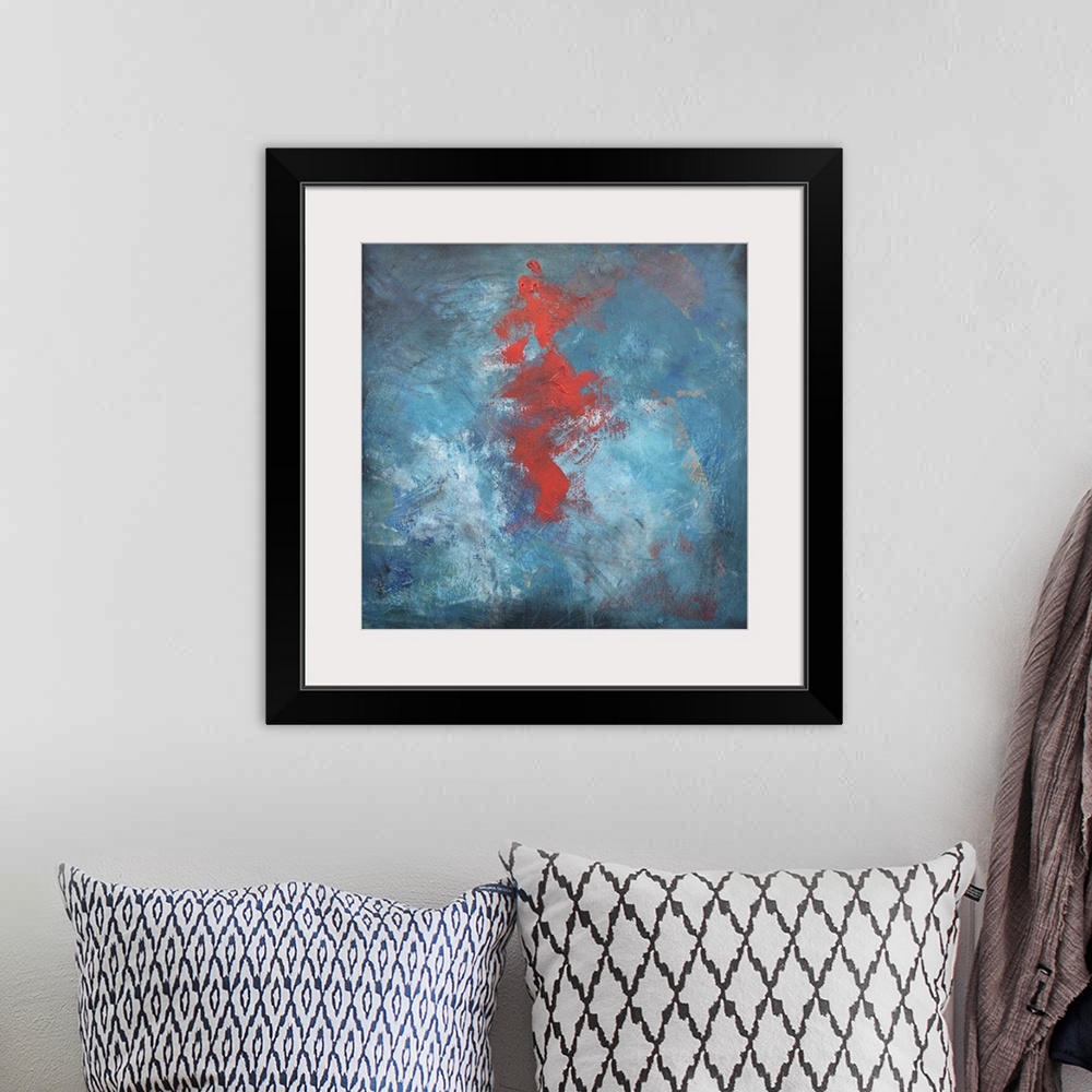 A bohemian room featuring Abstract contemporary painting with a large red center on blue.