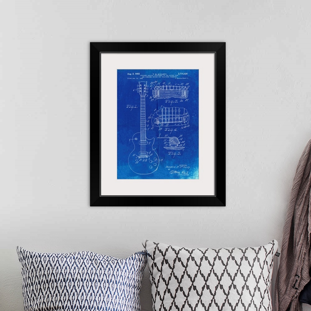 A bohemian room featuring Faded Blueprint Gibson Les Paul Guitar Patent Poster