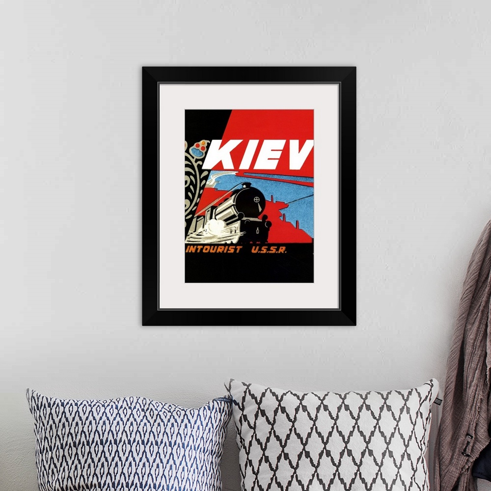 A bohemian room featuring Vintage travel advertisement for rail travel to Kiev.