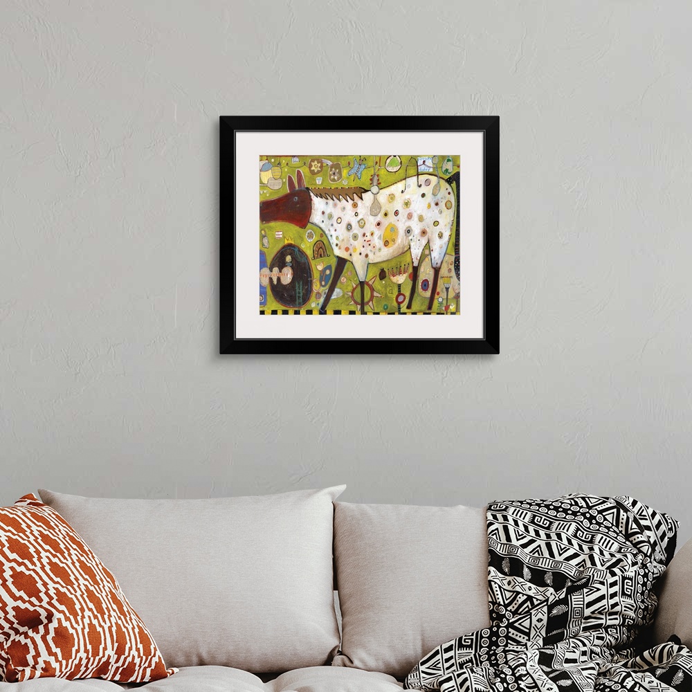 A bohemian room featuring Lighthearted contemporary painting of a horse against a green background.