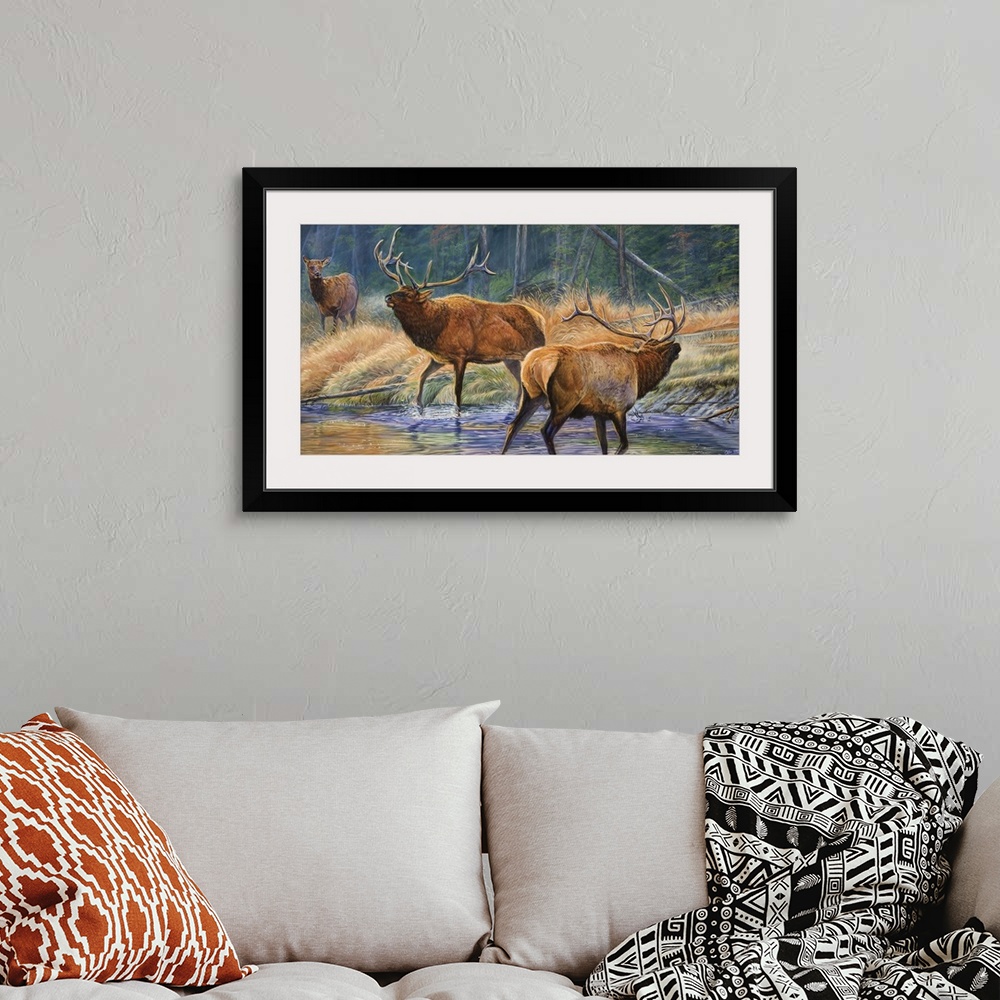 A bohemian room featuring two male elk challenging for female
