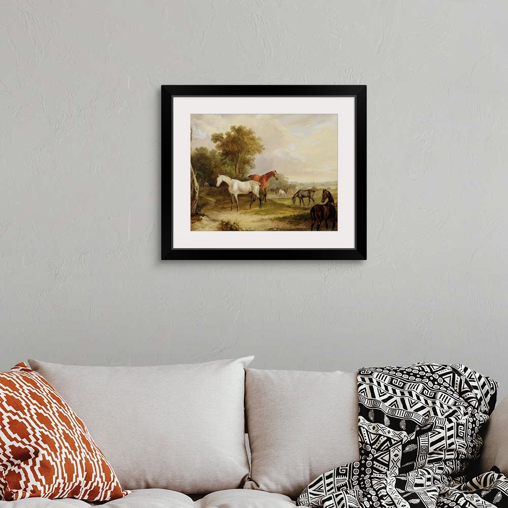 A bohemian room featuring Horses Grazing: A Grey Stallion grazing with Mares in a Meadow