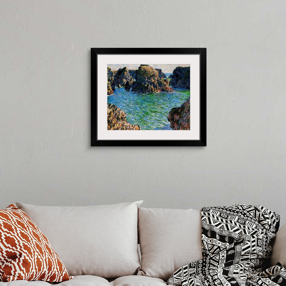 A bohemian room featuring Big oil painting on canvas of large rock formations surrounded by water in the ocean.