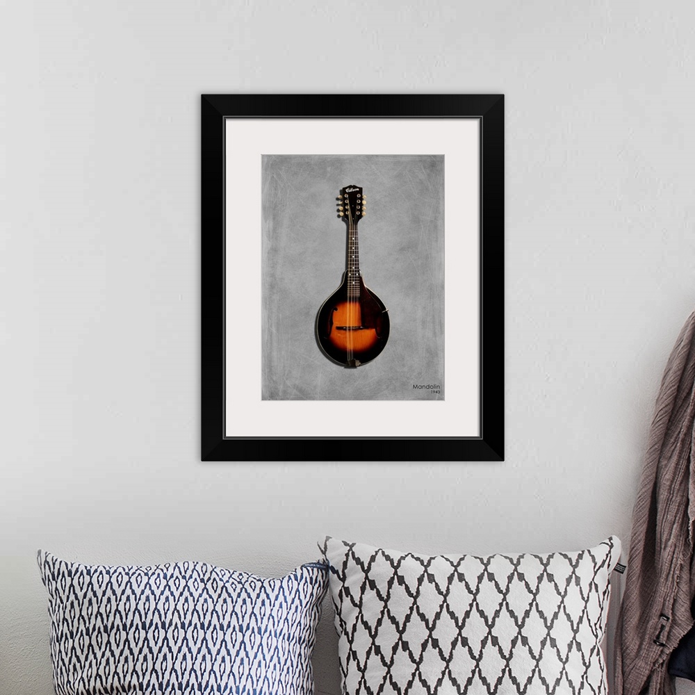 A bohemian room featuring Photograph of a Gibson Mandolin 1943 printed on a textured background in shades of gray.