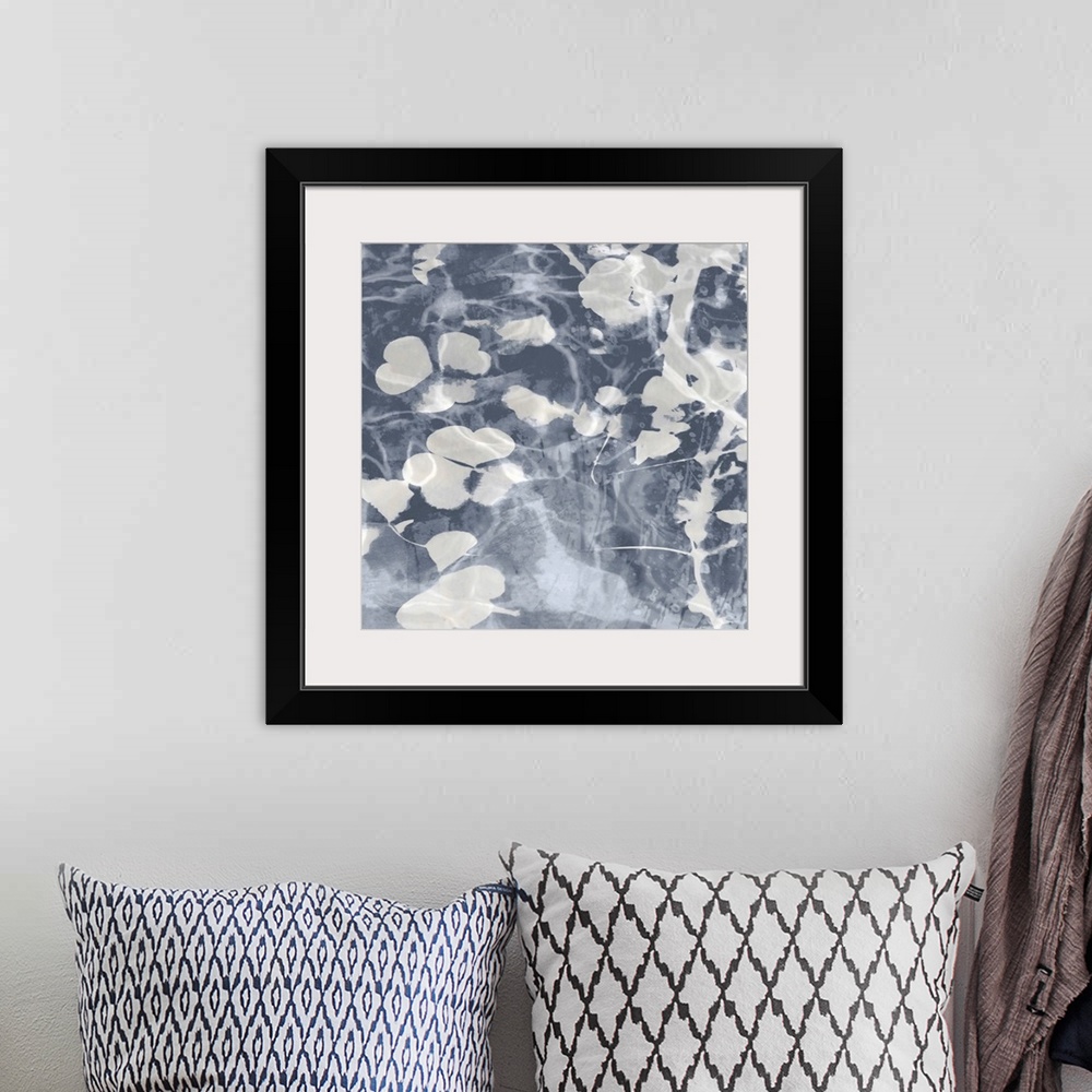 A bohemian room featuring Contemporary artwork featuring soft white petals over a mottled background in shades of gray.