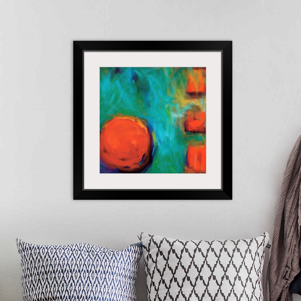 A bohemian room featuring Abstract square painting of a large circle and three small squares on the right in orange surroun...