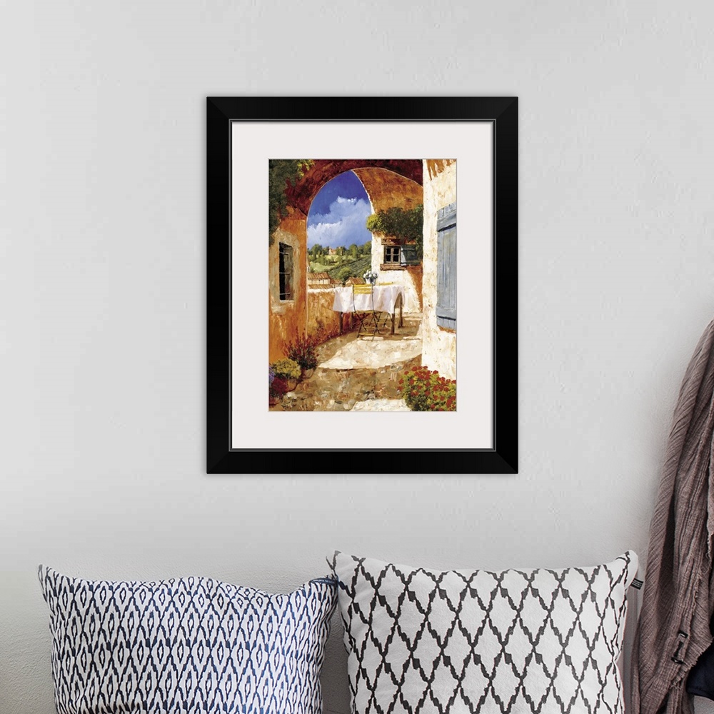 A bohemian room featuring Contemporary artwork of a Tuscan villa on a sunny day.