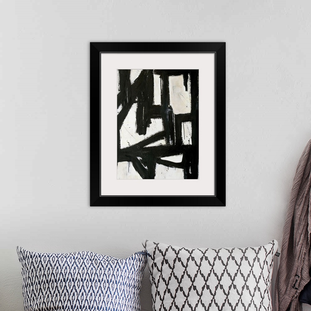 A bohemian room featuring Contemporary abstract painting with thick black lines on white.