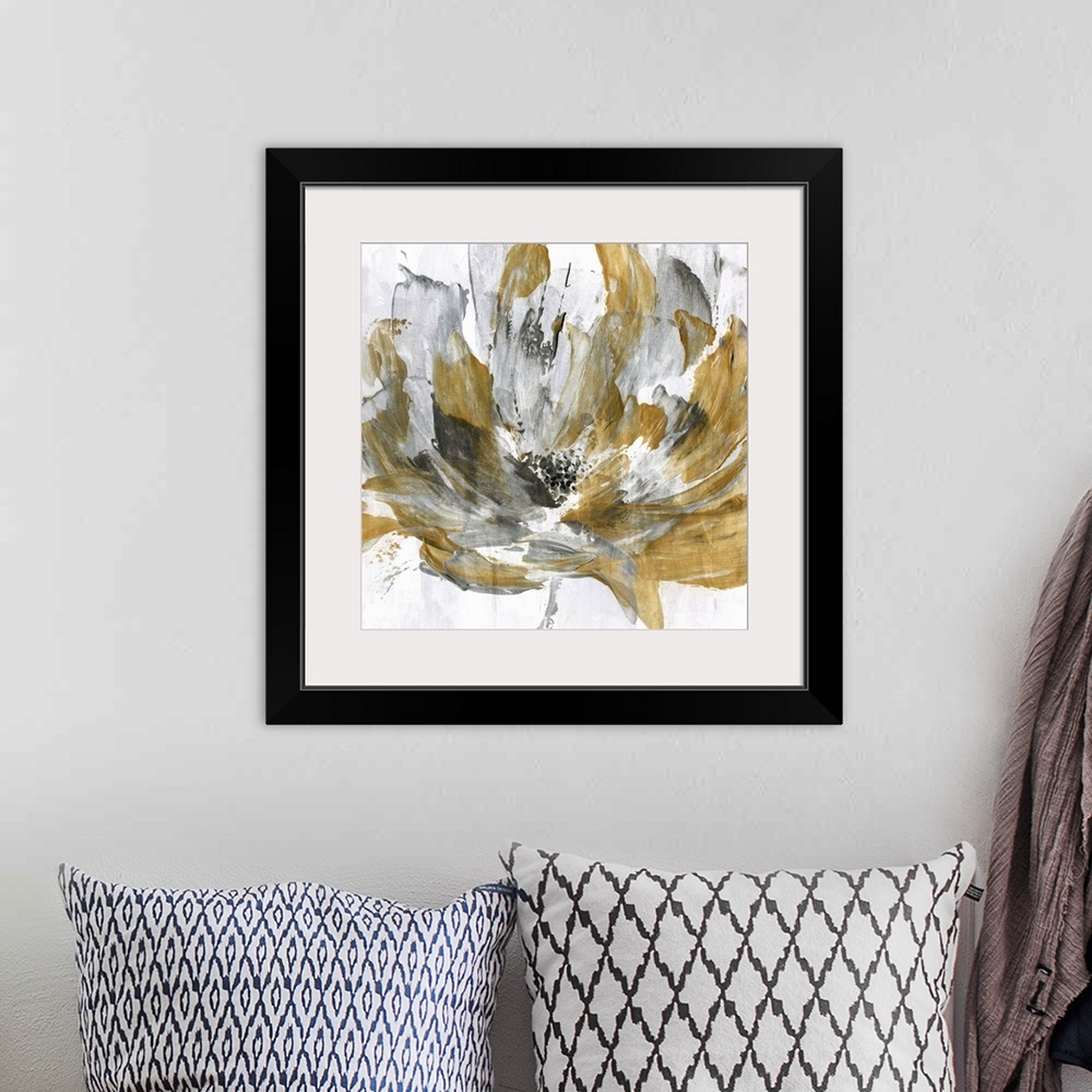 A bohemian room featuring Square abstract painting of a gold and silver flower.