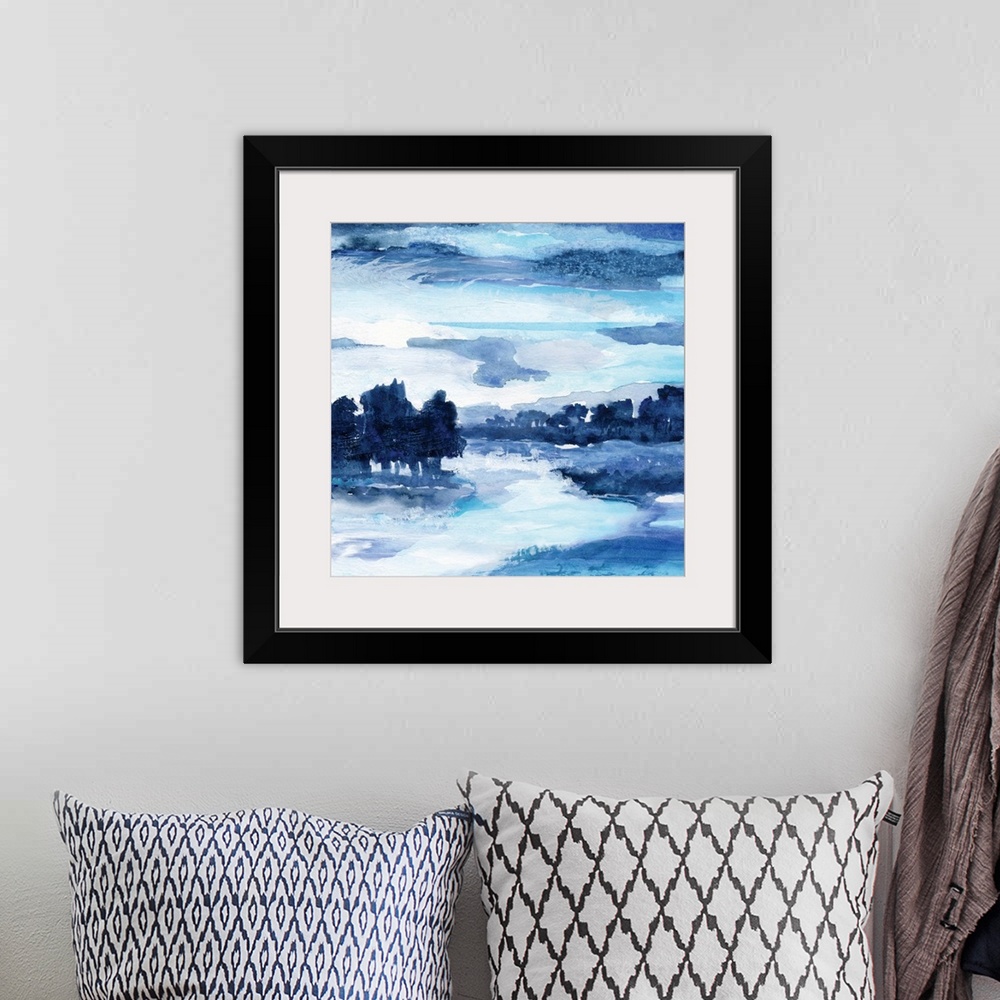 A bohemian room featuring Square watercolor landscape painting made with shades of blue.