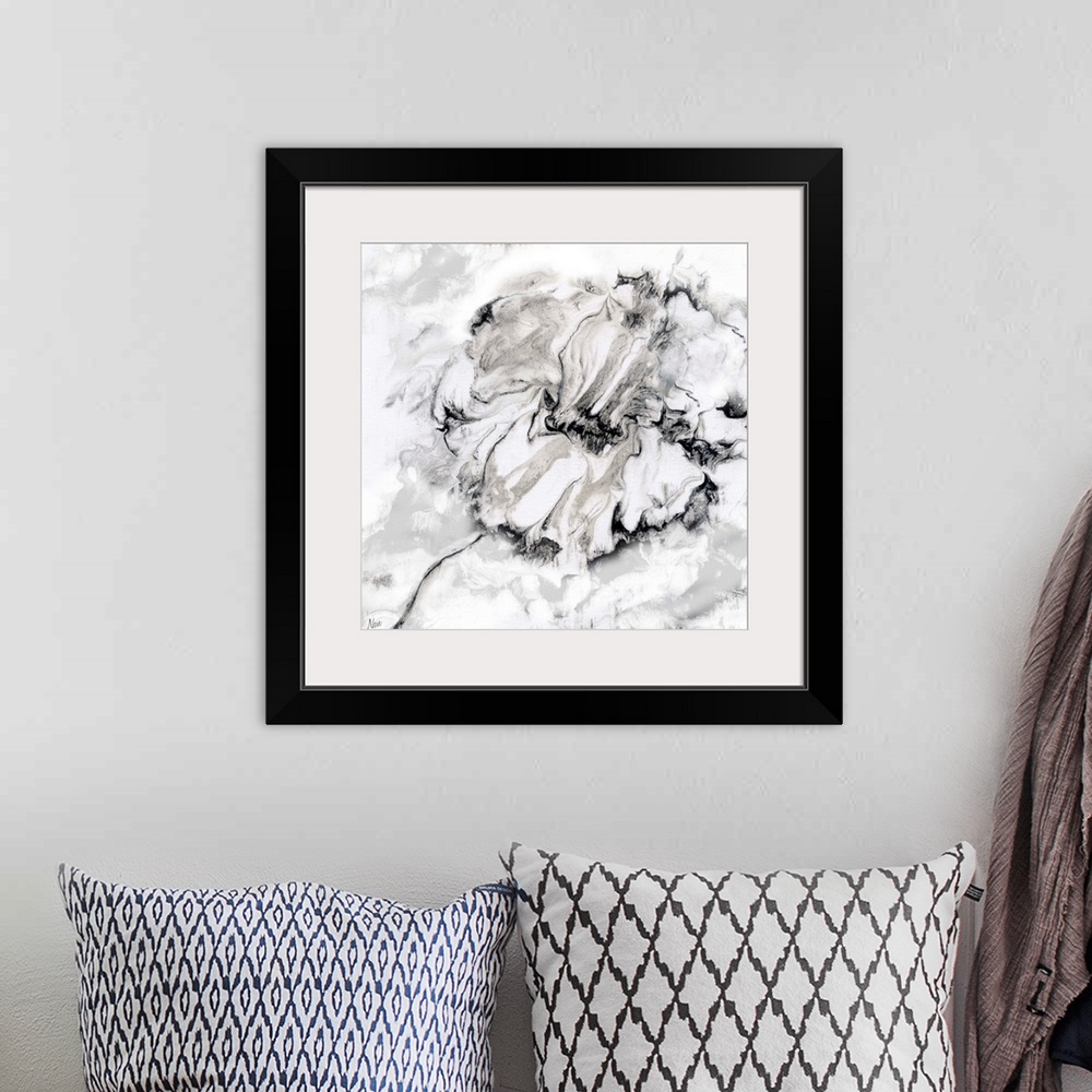 A bohemian room featuring Black and white art print of a flower with a wavy, marbled effect.