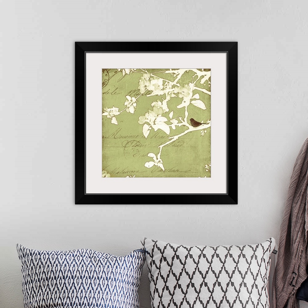 A bohemian room featuring Artwork featuring lettering and postmark overlain with a watercolor like branch and leaf silhouet...