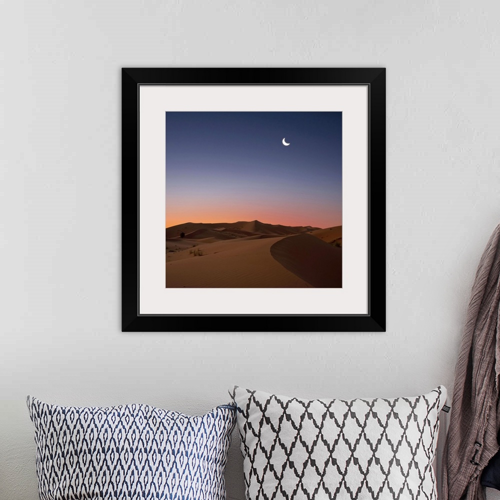 A bohemian room featuring Crescent moon over dunes in Sahara Desert at dawn, Morocco.
