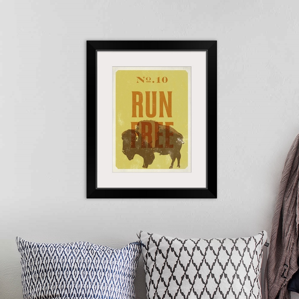 A bohemian room featuring Retro mid-century stylized poster art of a bison against a yellow background.