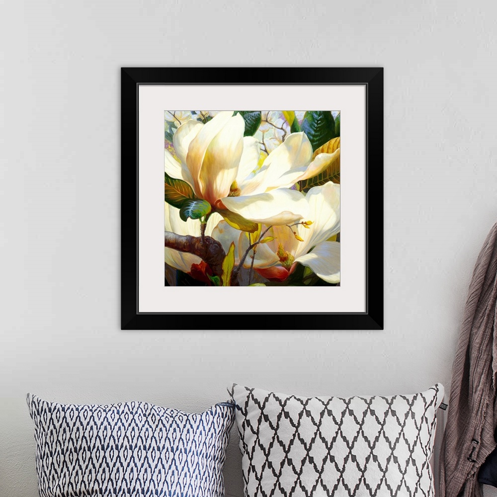 A bohemian room featuring A square shaped painting that is a realistic rendering of magnolia blossoms and leaves in the bri...