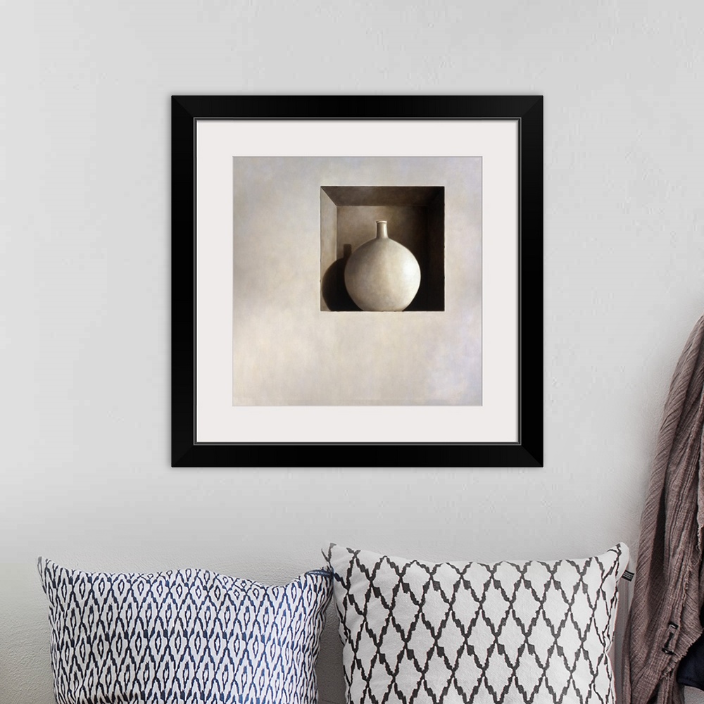 A bohemian room featuring Contemporary still life painting of a white vase sitting in a square hole in the wall.