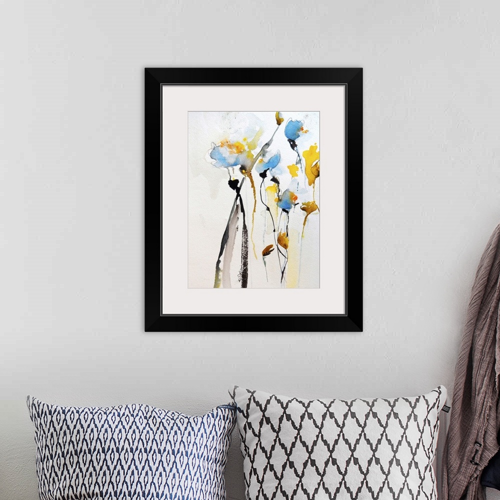A bohemian room featuring Contemporary watercolor painting of vibrant yellow and blue flowers.