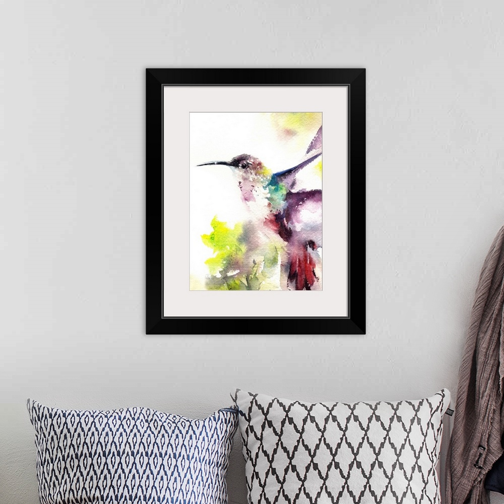 A bohemian room featuring A contemporary watercolor painting of a hummingbird hovering against a white background.